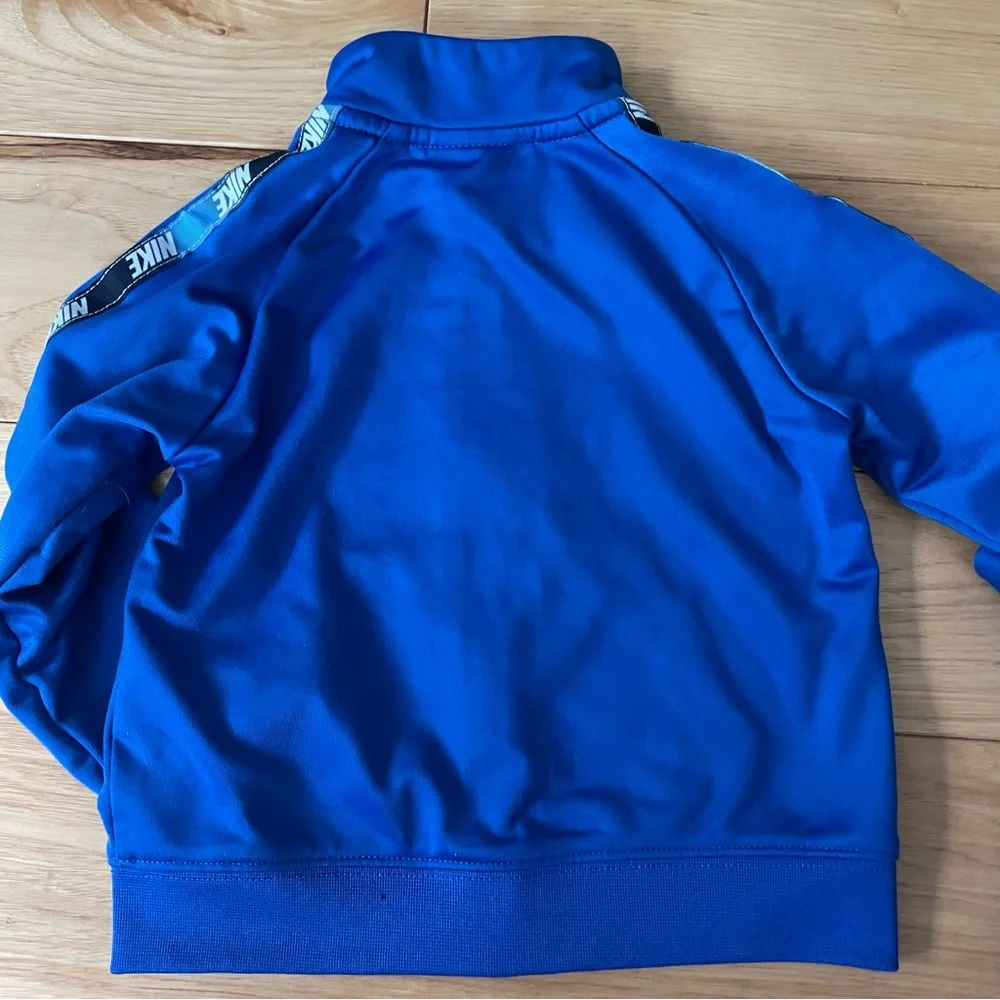 Nike both tracksuits